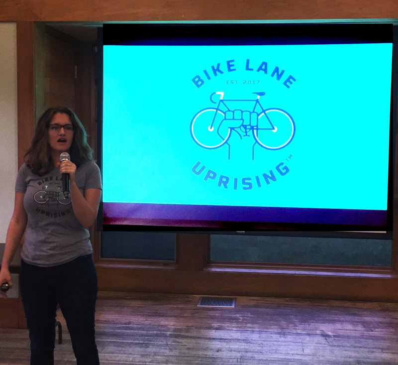 Christina Whitehouse speaking at an Evanston Bicycle Club meeting