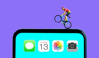 Cyclist riding on top of an mobile phone