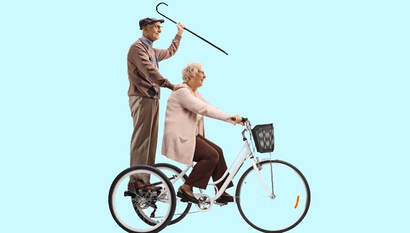 Senior man and woman riding an adult tricycle