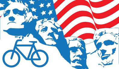 Presidential tribute at Mount Rushmore with an American flag and a bicycle