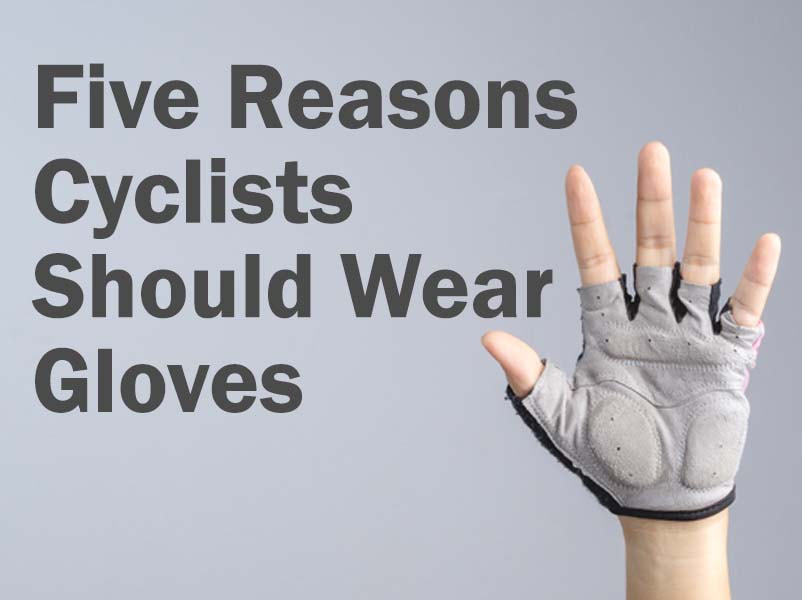 Photo a a hand wearing a short fingered bike glove